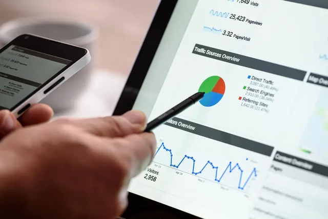 Reviewing metrics and traffic on a dashboard shown on a tablet