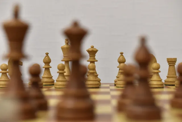 Chess pieces on a board, a symbol of strategic planning